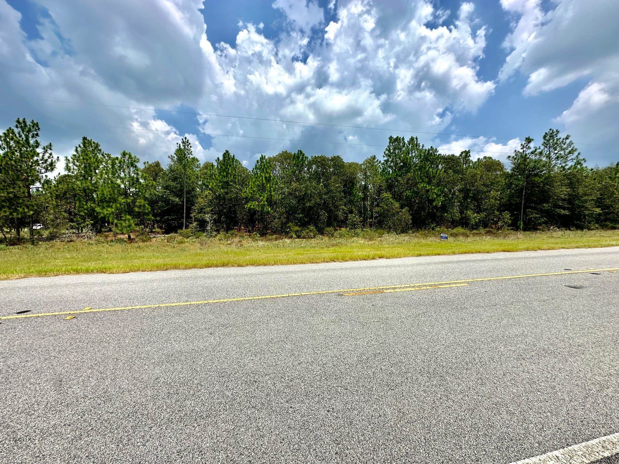 0 Highway 46 Metter, GA 30471 - Photo 3 of 5 a view of a swimming pool and mountains in the background