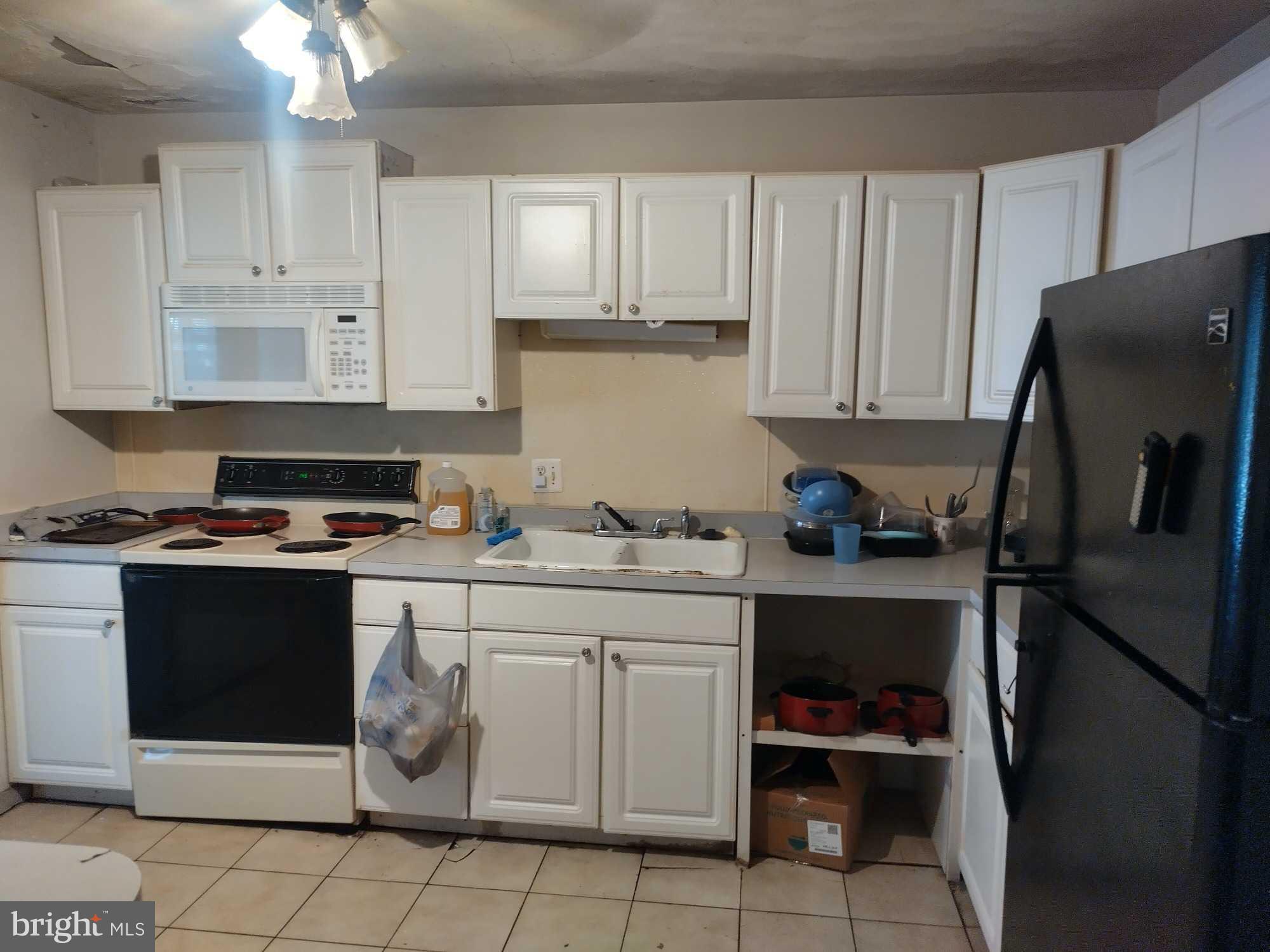 701 Drexel Road Harrisburg, PA 17109 - Photo 7 of 20 a kitchen with a sink and cabinets