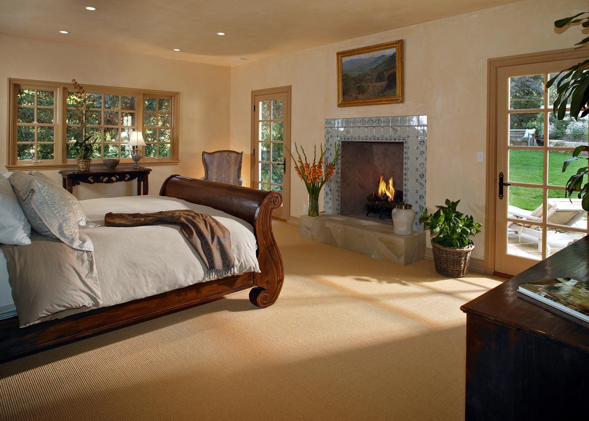 1401 School House Road Montecito, CA 93108 - Photo 3 of 9 a bed room with a bed and a fireplace