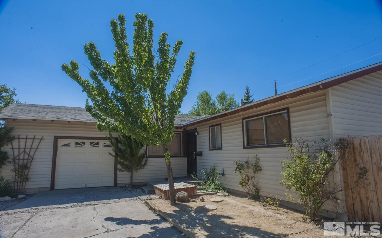 3285 Sandra Drive Reno, NV 89503 - Photo 1 of 1 a plant is sitting in front of a house