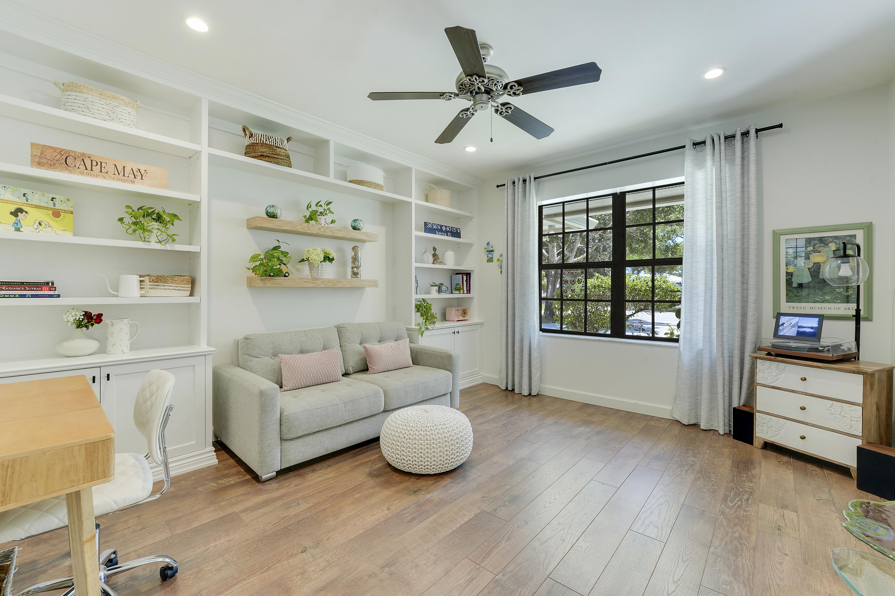 18784 Falcon Way Jupiter, FL 33458 - Photo 13 of 47 a living room with furniture and window