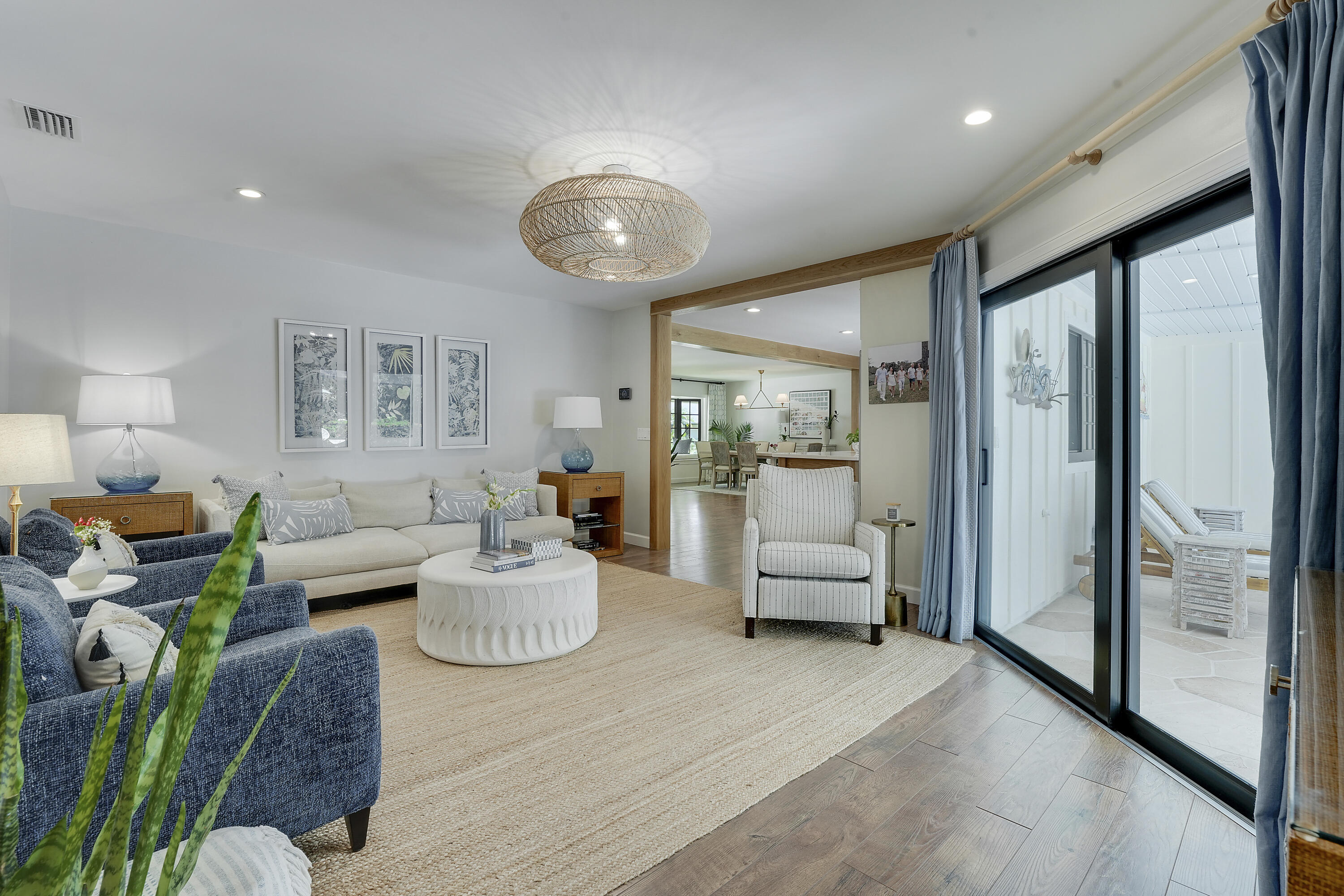 18784 Falcon Way Jupiter, FL 33458 - Photo 16 of 47 a living room with furniture and a large window