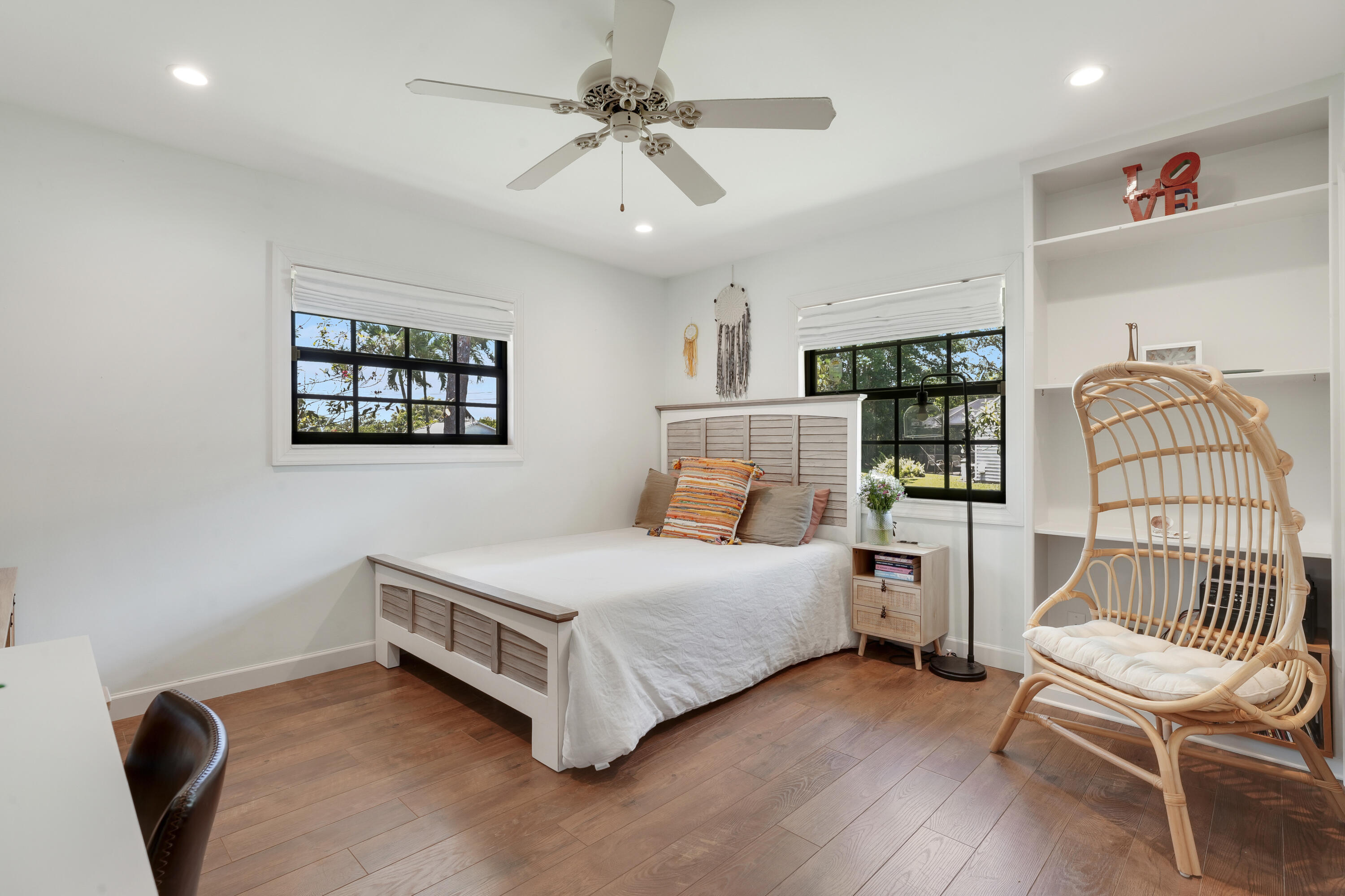 18784 Falcon Way Jupiter, FL 33458 - Photo 23 of 47 a bedroom with a bed chair and window