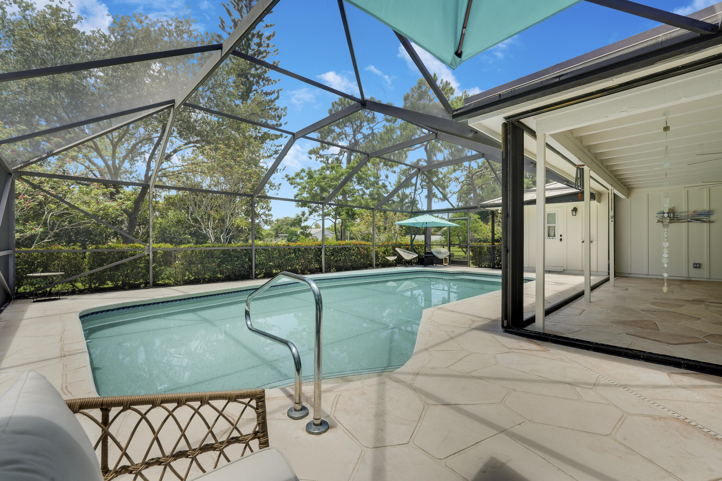 18784 Falcon Way Jupiter, FL 33458 - Photo 31 of 47 a view of a patio with a backyard