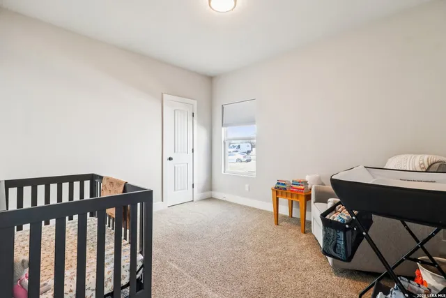 a livingroom with workspace and a couch