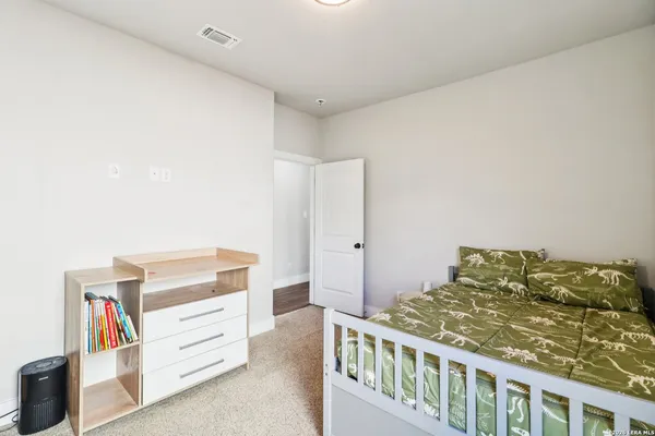 a bedroom with a bed and closet