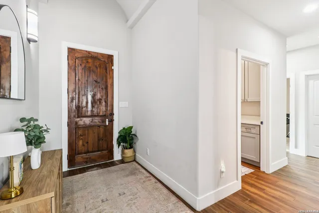 a view of entryway with wooden floor