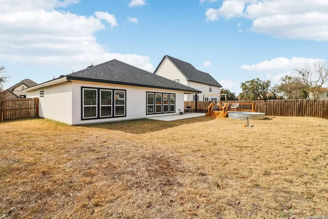 a house view with a outdoor space