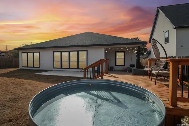 a view of a house with swimming pool