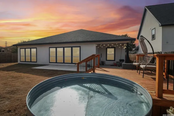 a view of a house with swimming pool