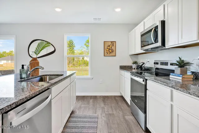 $355,240 | 1315 Pogy Lane, Unit 35, Winnabow, NC 28479