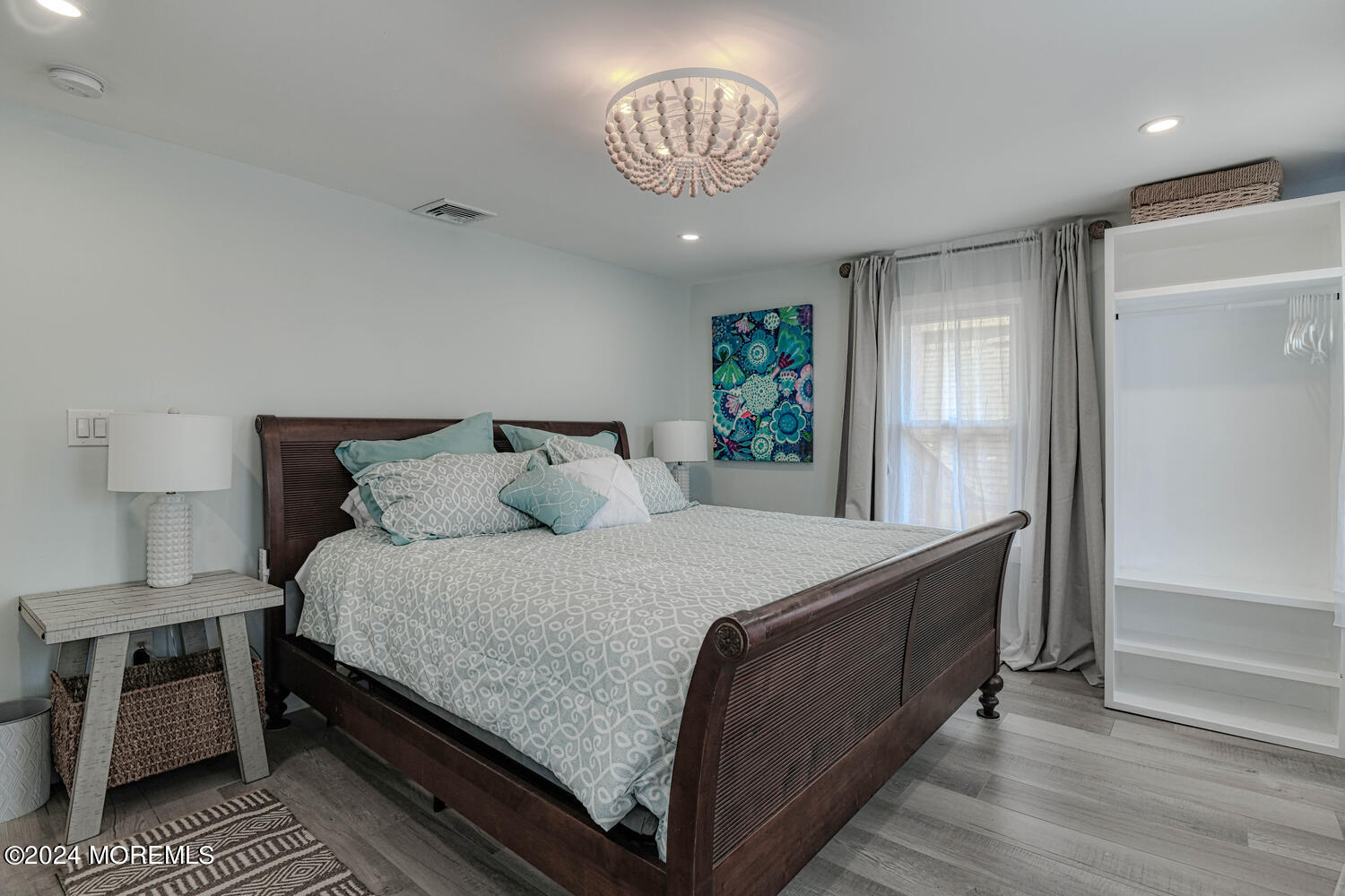 83 Broadway Ocean Grove, NJ 07756 - Photo 30 of 40 a bedroom with a bed and window
