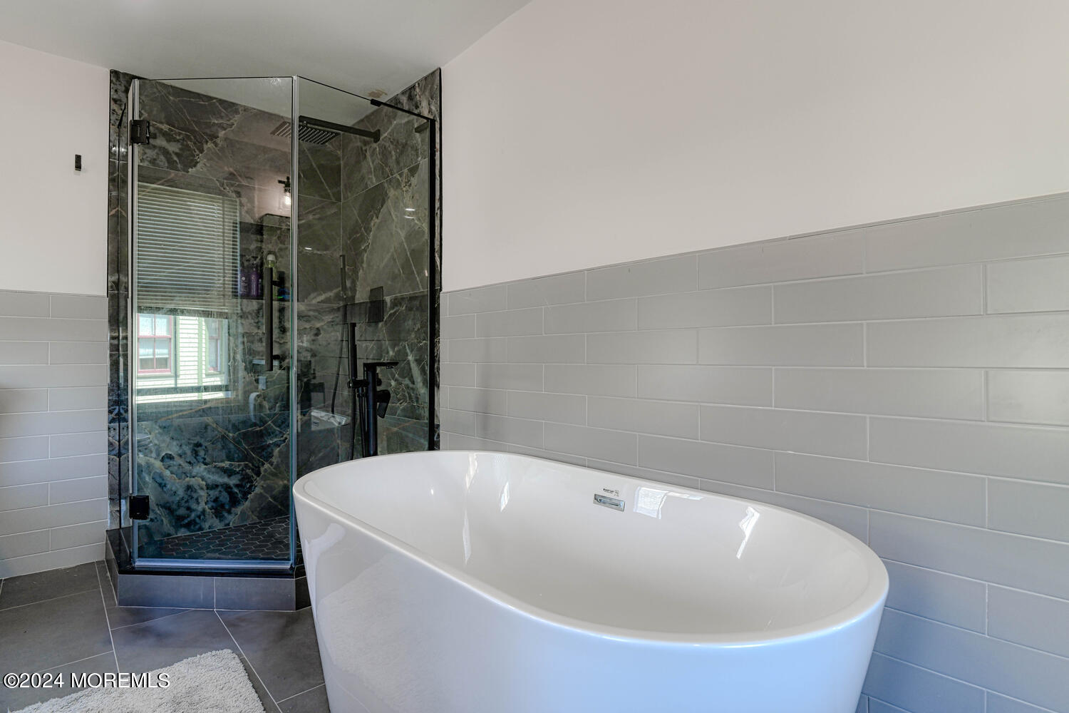 83 Broadway Ocean Grove, NJ 07756 - Photo 36 of 40 a bathroom with a bathtub and shower