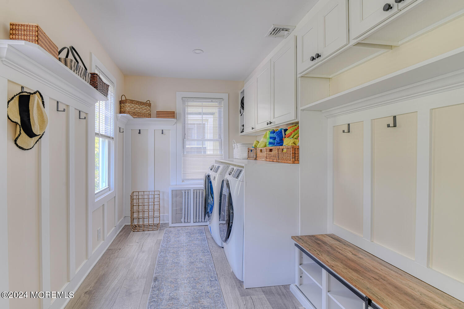 83 Broadway Ocean Grove, NJ 07756 - Photo 10 of 40 a view of hallway with washer and dryer