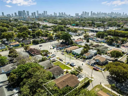an aerial view of a city with lots of residential buildings