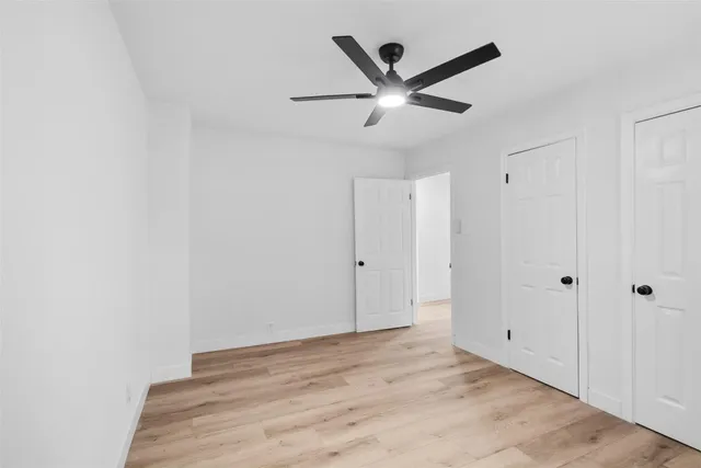 a bathroom with a sink toilet and a mirror