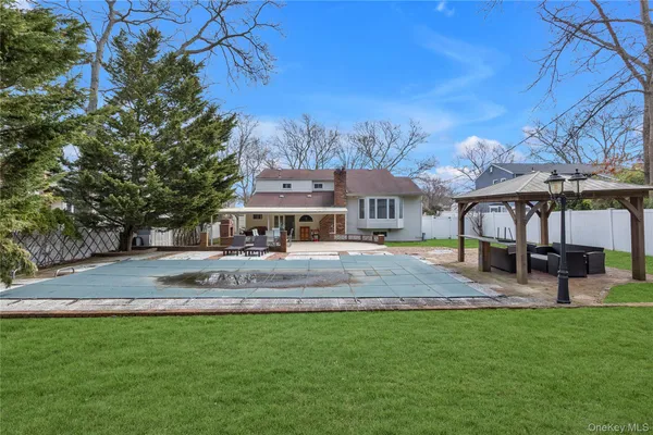 a view of balcony with couch and outdoor seating