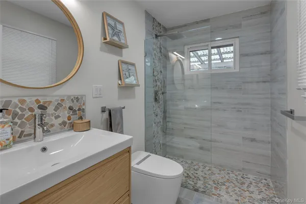 a kitchen with stainless steel appliances a refrigerator stove microwave and sink