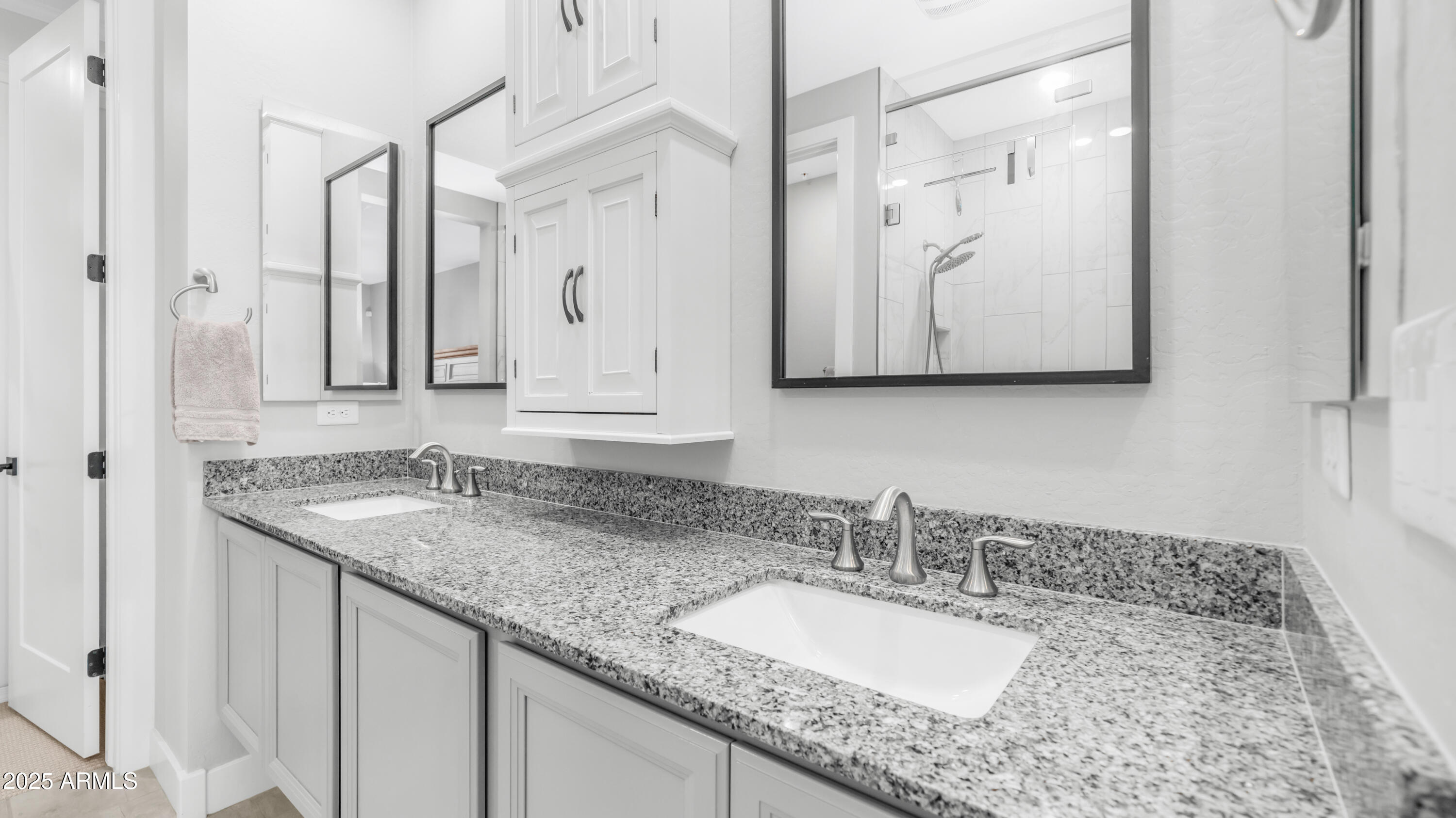 3855 South McQueen Road, Unit 60 Chandler, AZ 85286 - Photo 20 of 43 a bathroom with a granite countertop sink and a mirror