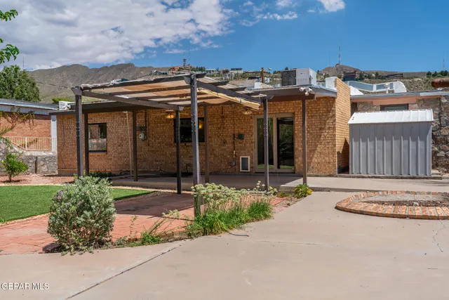 a view of a backyard with a garden