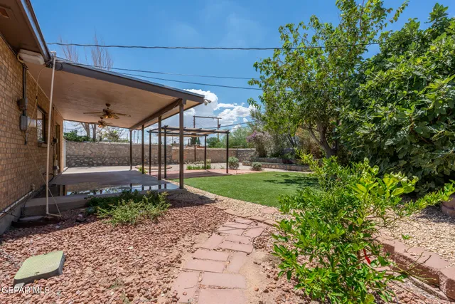 a view of a backyard with garden
