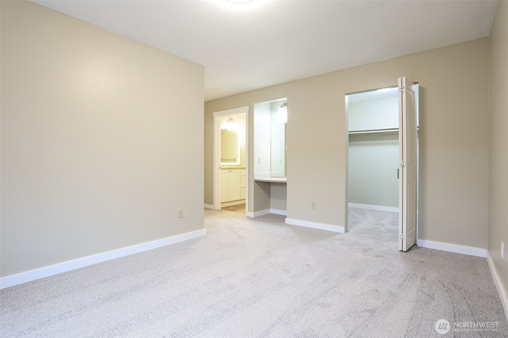 12303 Harbour Pointe Boulevard, Unit W101 Mukilteo, WA 98275 - Photo 14 of 25 an empty room with a empty space and windows