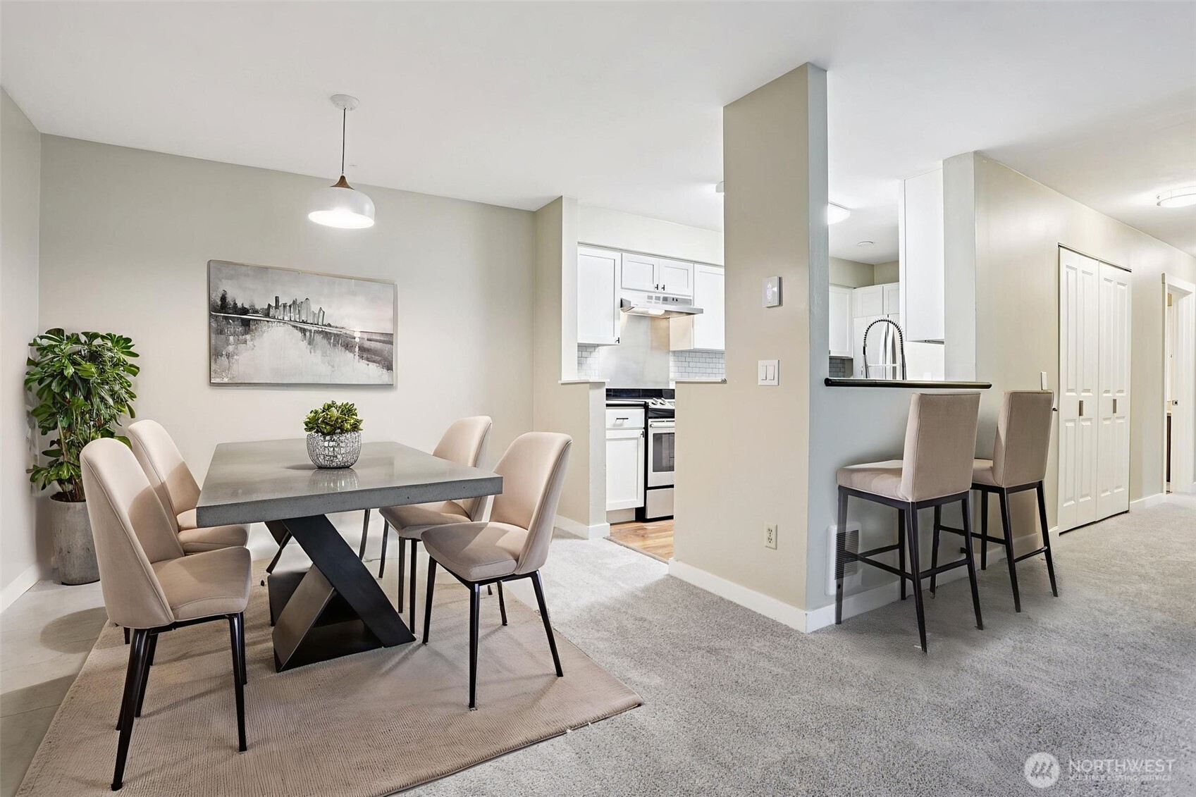 12303 Harbour Pointe Boulevard, Unit W101 Mukilteo, WA 98275 - Photo 7 of 25 a view of a dining room with furniture