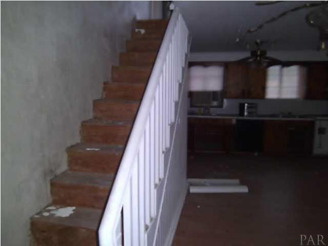 810 Barth Road Molino, FL 32577 - Photo 10 of 16 Stairs leading to the bedrooms