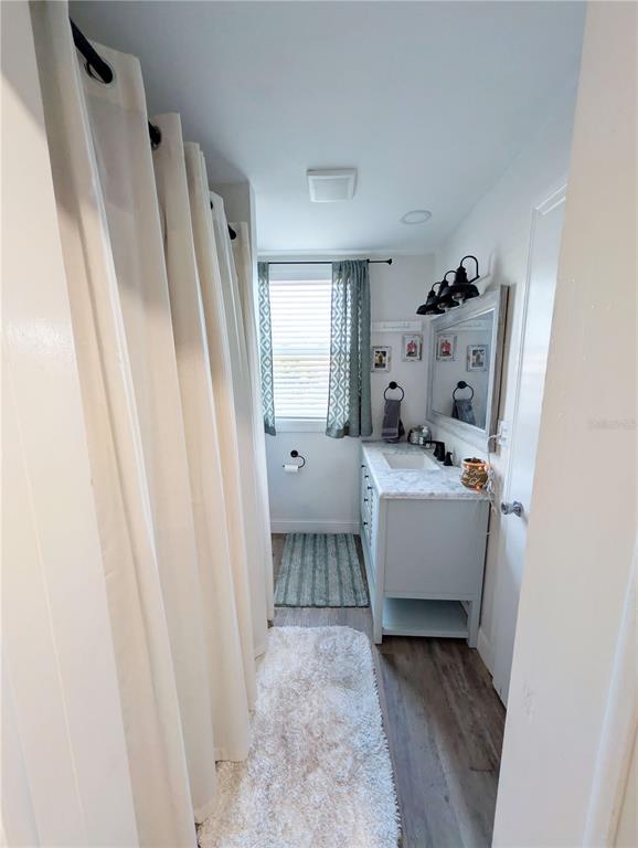 1007 77th Street East Palmetto, FL 34221 - Photo 12 of 39 a view of living room with furniture and a window