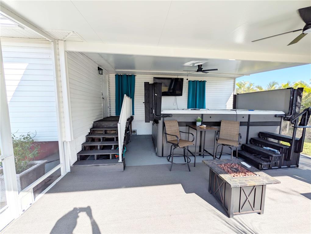 1007 77th Street East Palmetto, FL 34221 - Photo 21 of 39 a living room with furniture and a piano