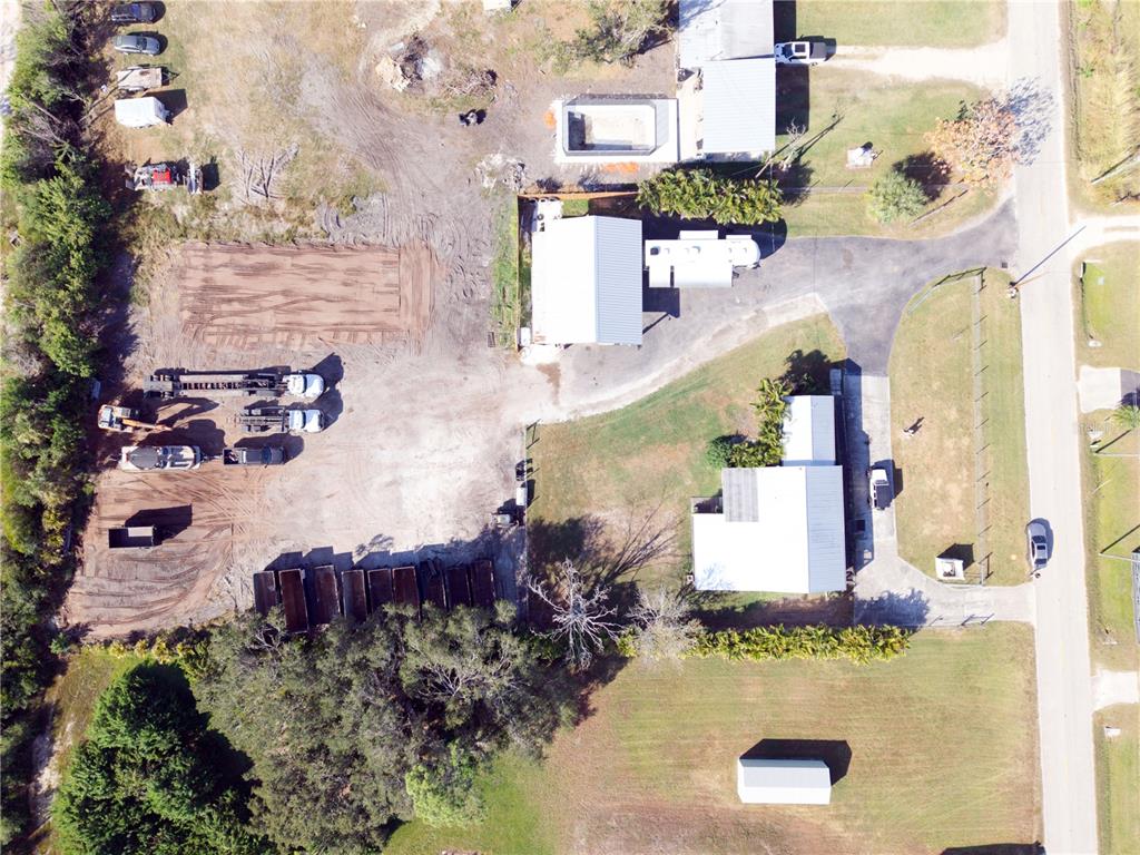 1007 77th Street East Palmetto, FL 34221 - Photo 25 of 39 an aerial view of a house with a swimming pool