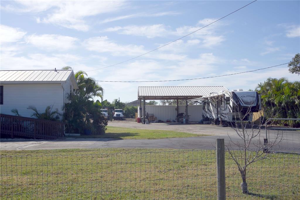 1007 77th Street East Palmetto, FL 34221 - Photo 28 of 39 a view of a backyard