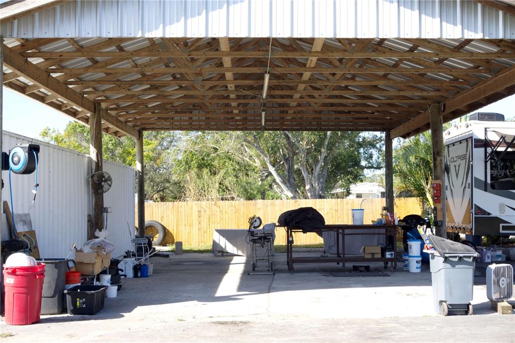 1007 77th Street East Palmetto, FL 34221 - Photo 30 of 39 a living room with furniture and a large window