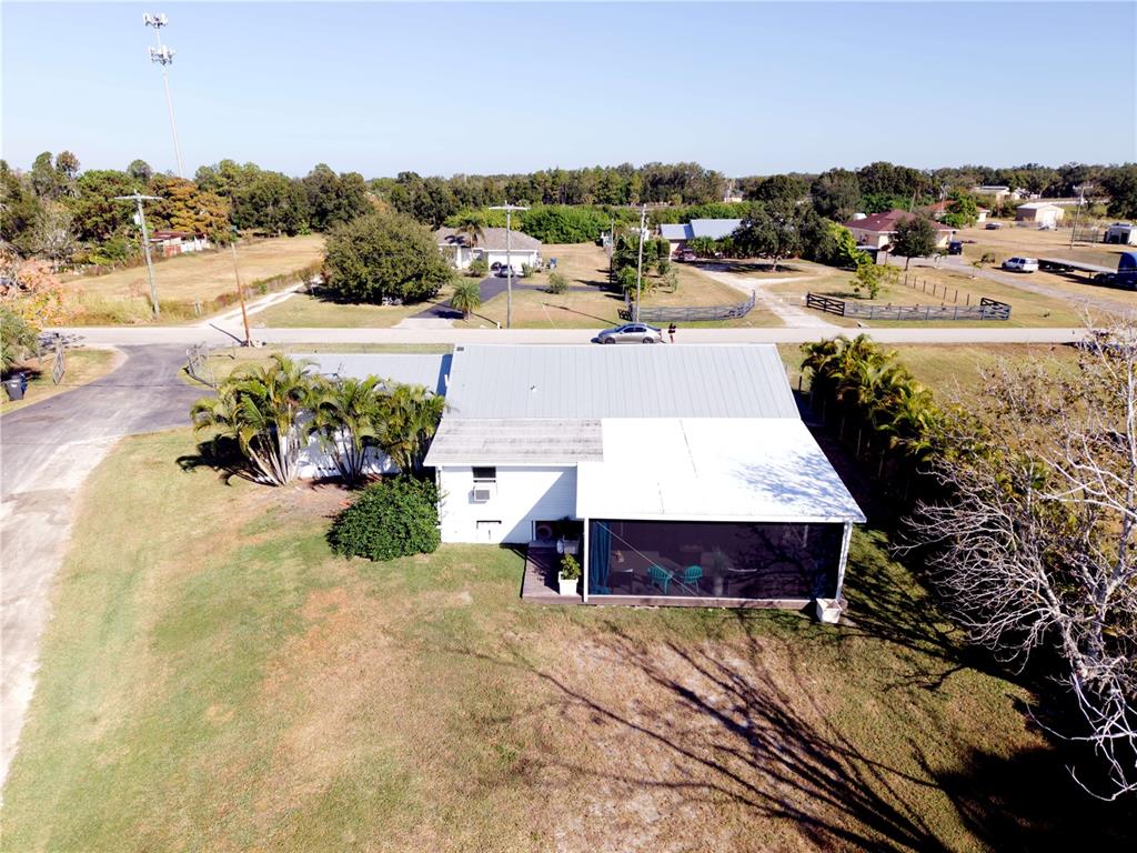 1007 77th Street East Palmetto, FL 34221 - Photo 31 of 39 a swimming pool view with a lake view