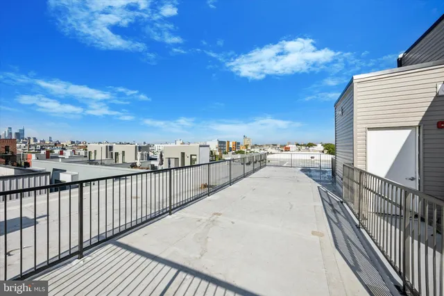 a view of a balcony with city view
