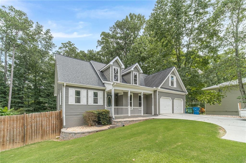 1190 Rocky Road Lawrenceville, GA 30044 - Photo 1 of 1 a front view of a house with a yard