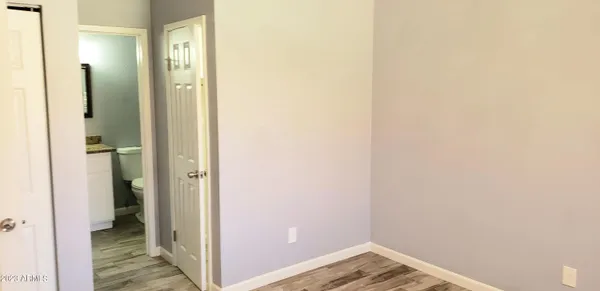a view of a bathroom with a shower and a sink