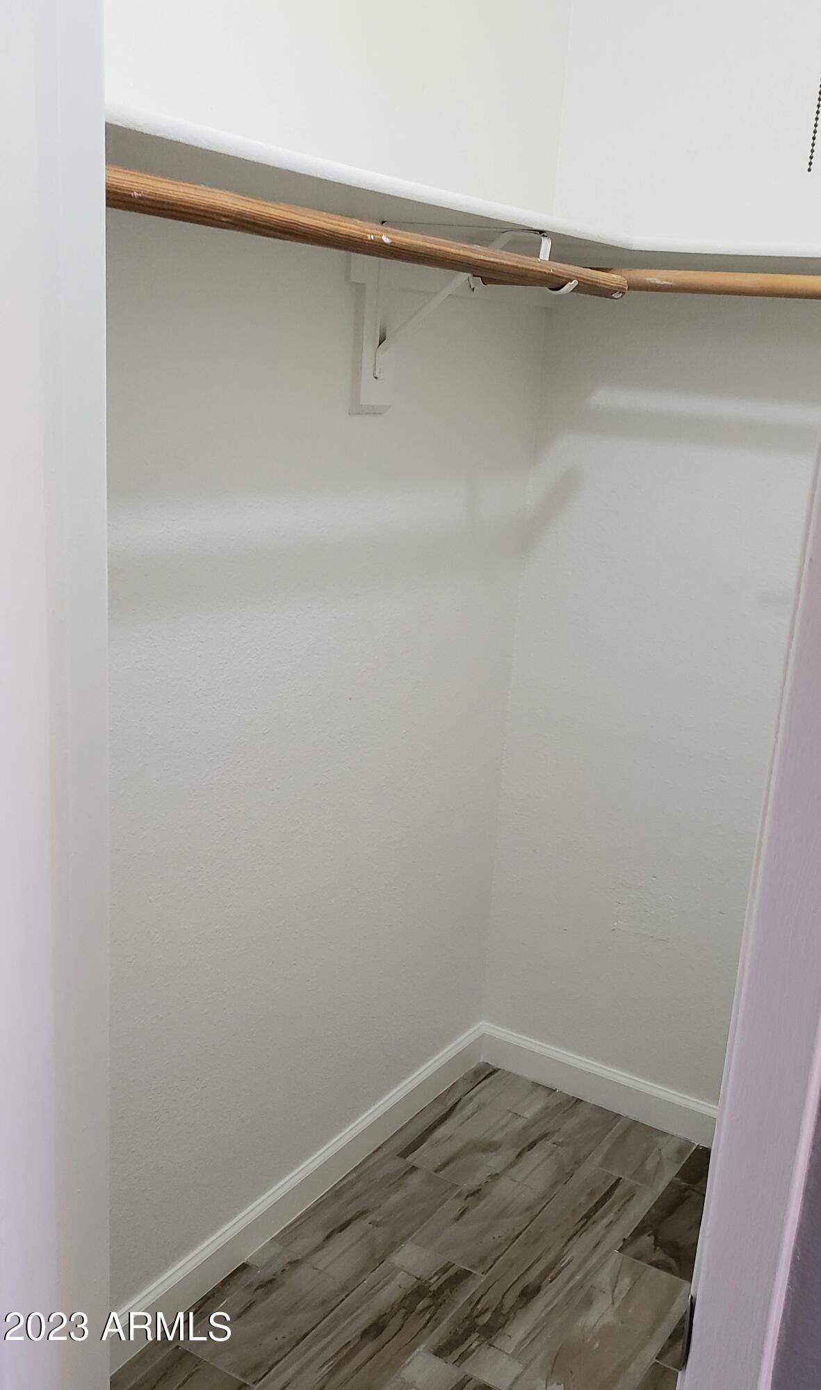 3511 East Baseline Road, Unit 1057 Phoenix, AZ 85042 - Photo 17 of 30 a view of small space with racks on the wall