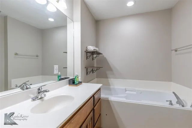 a bathroom with a sink and a bathtub