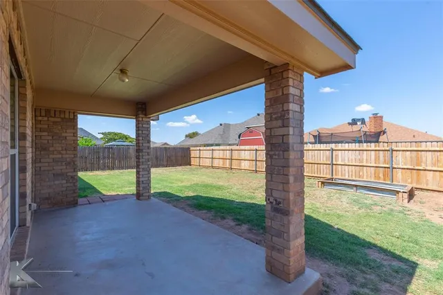 a view of a backyard with plants