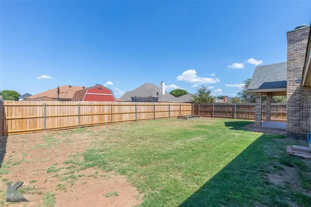 a view of outdoor space and yard