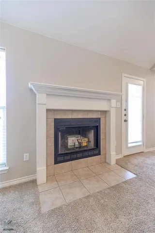 a living room with a fireplace