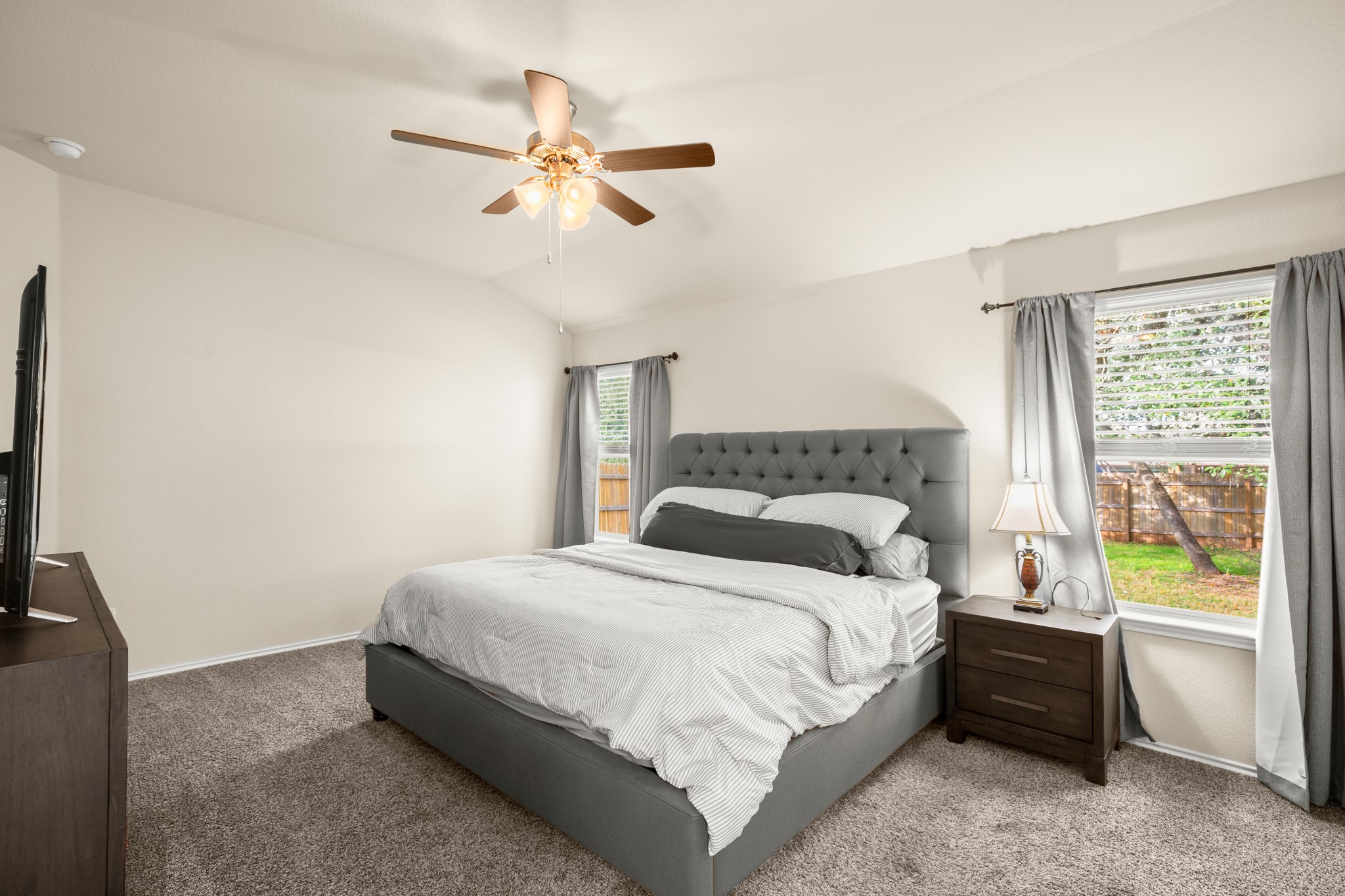 5526 Perdita Drive Belton, TX 76513 - Photo 10 of 26 Carpeted bedroom with lofted ceiling and a ceiling fan