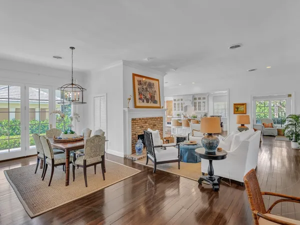 a view of a livingroom with furniture window and wooden floor