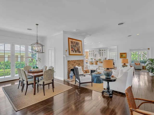 a view of a livingroom with furniture window and wooden floor