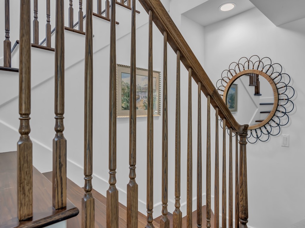 986 Riomar Drive Vero Beach, FL 32963 - Photo 19 of 36 a view of staircase with railing and a chandelier