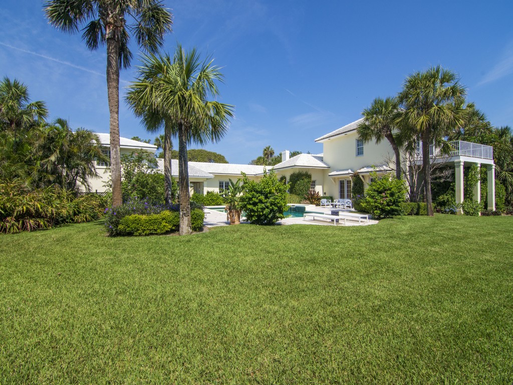 986 Riomar Drive Vero Beach, FL 32963 - Photo 2 of 36 a view of a house with a backyard
