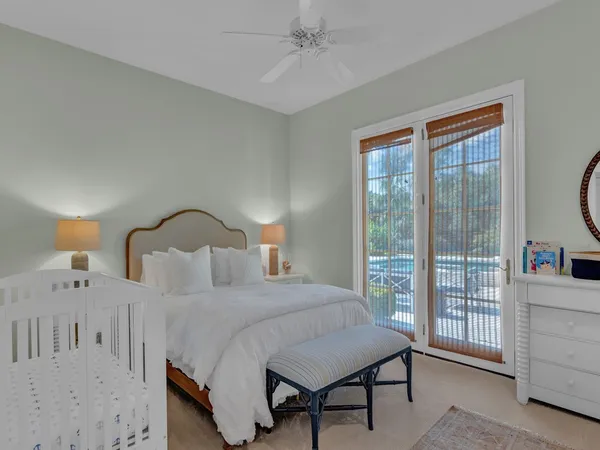 a bedroom with furniture and a window