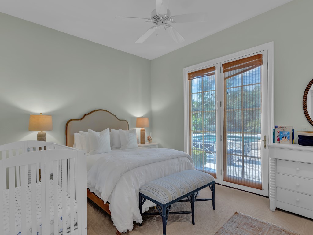 986 Riomar Drive Vero Beach, FL 32963 - Photo 27 of 36 a bedroom with furniture and a window