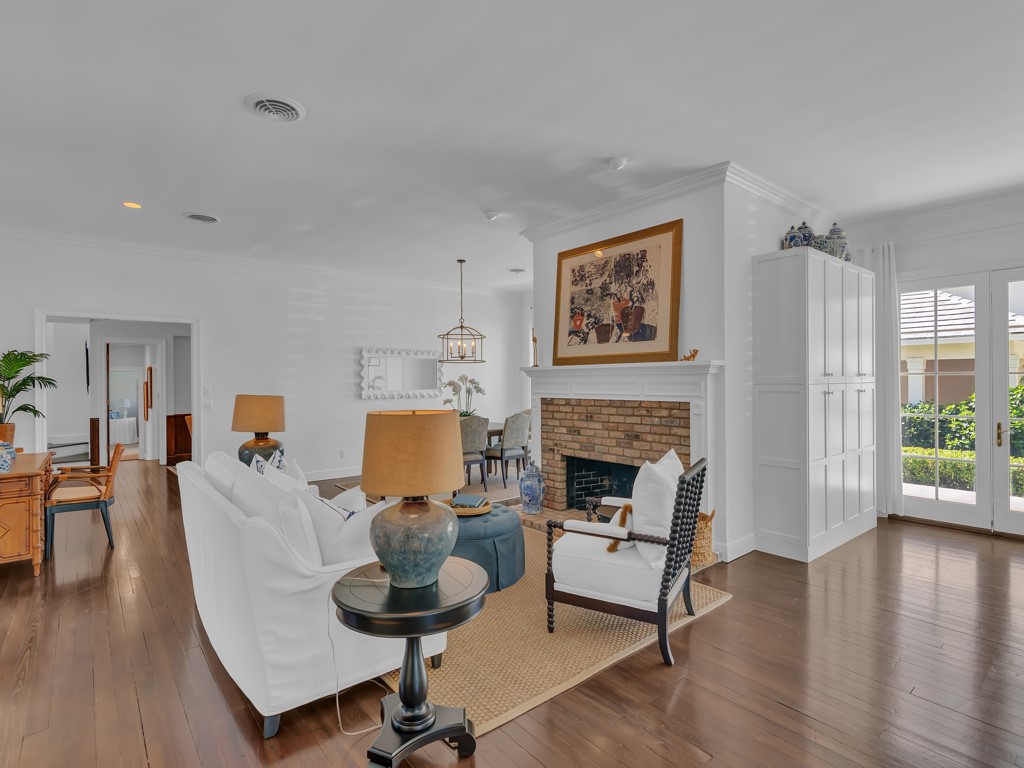 986 Riomar Drive Vero Beach, FL 32963 - Photo 4 of 36 a living room with furniture and a fireplace